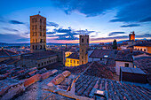 View of city skyline and rooftops from Palazzo della Fraternita dei Laici at dusk, Arezzo, Province of Arezzo, Tuscany, Italy, Europe