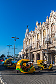 Coco taxis in front of the Theatre of Havana, Cuba, West Indies, Central America