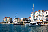 Boats and waterfront restaurants, Harbor, Porec, Croatia, Europe