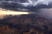 A storm passes through the Grand Canyon during a summer day, Tusayan, Arizona, United States of America, North America