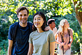 Young adult couple looking at the camera during hiking excursion