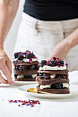 Black Forest cake with layers of chocolate cake, cherries and whipped cream