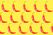 Chilli pepper pattern on a yellow background