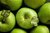 Green apples and water droplets