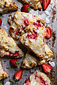 Strawberry cream cheese scones on a baking tray