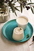 fresh cheese of Burgos, spanish white cheese. natural linen table cloth