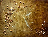 Peanuts scattered on roasting pan