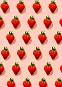 Strawberry pattern on pink background