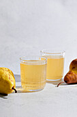 Pear Cider on a Light Background with Hard Light