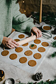 Baking Christmas almond butter biscuits with candlelight in an atmospheric style