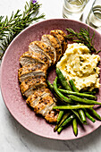 Turkey fillet with mashed potatoes and greens