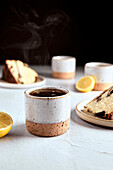 Black Tea with Lemon in Small Ceramic Mugs