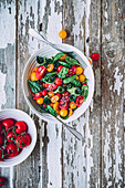 Summer salad on a wooden background