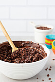 Double chocolate crackles mix in a white mixing bowl
