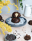 Chocolate bread with tahini spread in a table with yellow flowers