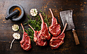 Raw fresh meat Veal ribs, spices and Meat cleaver on wooden background