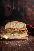 Vegan burger with vegetable patty on a wooden background