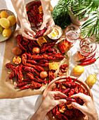 Crawfish party, cooked Louisiana, with corn on the cob, potatoes. Crawfish cooked in Cajun spices and herbs.with beer, New Orleans, Classic Cajun or Creole cuisine