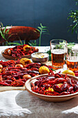 Crawfish party, cooked Louisiana, with corn on the cob, potatoes. Crawfish cooked in Cajun spices and herbs.with beer, New Orleans, Classic Cajun or Creole cuisine