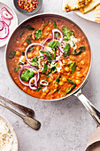 Chickpeas curry in a saucepan