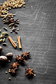 Whole Indian Garam Masala Spices on a Wood Surface