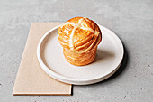Hot cross cruffin: croissant dough with hot cross bun flavours in a muffin shape topped with a classic cross