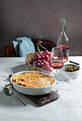 shepherd's pie or cottage pie is casserole with a layer of cooked meat and vegetables, topped with mashed potatoes