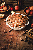 Lattice topped Apple Pie on a wooden table