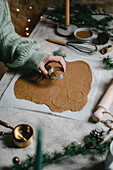Baking Christmas almond butter biscuits with candlelight in an atmospheric style