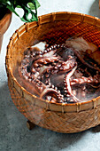 steamed octopus in a bamboo steamer, Asian style