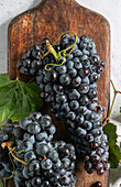 ripe grapes, winemaking, on a ceramic tile table, Mediterranean, concept of autumn, vineyards