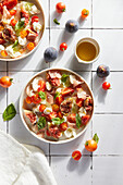 Salad of figs, proscuitto, tomatoes and mozzarella