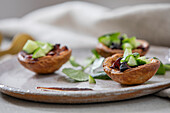 Duck hoisin tartlets on a plate