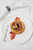 Custard toffee tart with berries