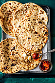 Flatlay of stuffed Aloo paratha Indian potato flatbread