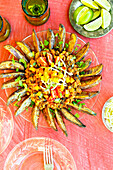 Vegetarian Three Bean Chili Fries on a pink background