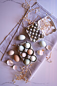 Araucana Chicken Free Range Eggs, including blue and green colors, with Japanese Jumbo Quail Eggs Flatlay.