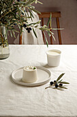 fresh cheese of Burgos, spanish white cheese. natural linen table cloth