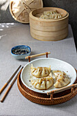 Gyoza Japanese korean dumplings on gray plate on the table.