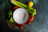 Top view of a healthy vegetable salad ingredients on concrete table ready for cooking