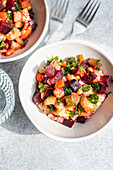 Tasty healthy baked vegetable salad served in the bowl