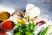 Traditional Georgian food concept with spices, sauces and wines on concrete table