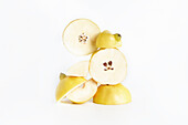 Deconstructed scene with beautifully bio quince with a white background
