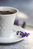 Espresso coffee with lavender on concrete background