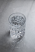 Glass of water on marble board