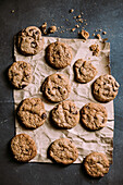 From above homemade chocolate chips cookies on a piece of paper