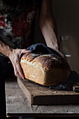 Cropped unrecognizable person preparing a milk bread brioche