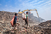 Child labourers working in rubbish dump
