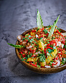 Exotic salad with citrus fruits and prawns