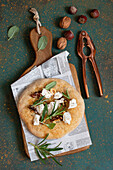 Wholemeal pizza with truffle, walnut burrata, sage and rosemary
